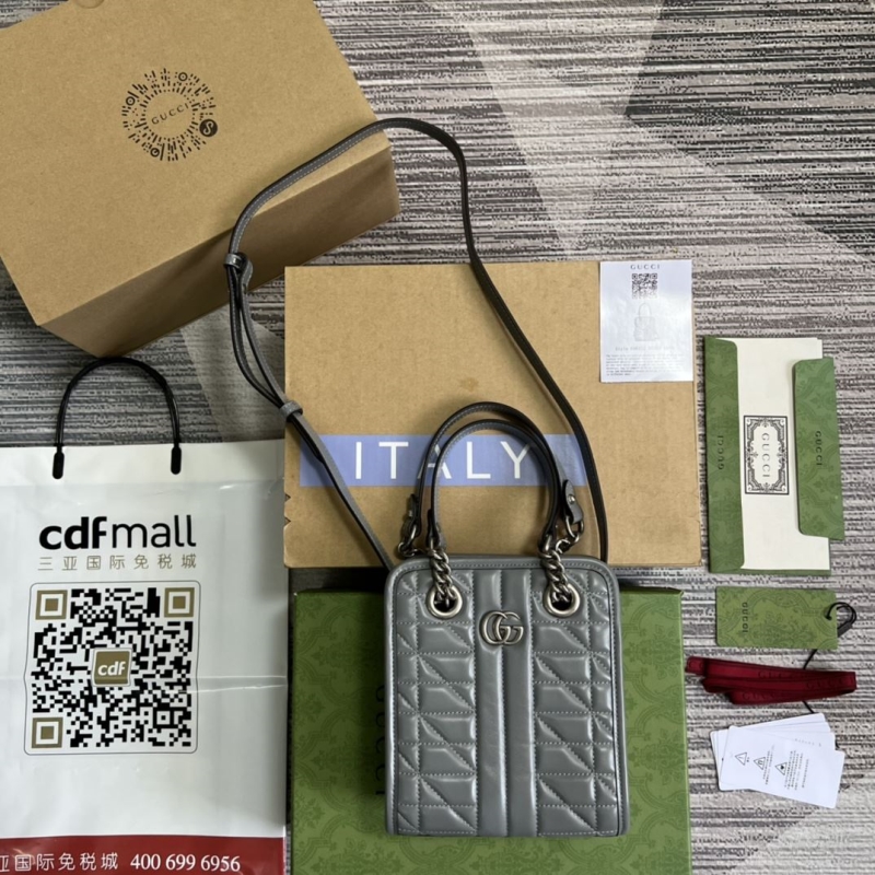 G*u*i top handle bags